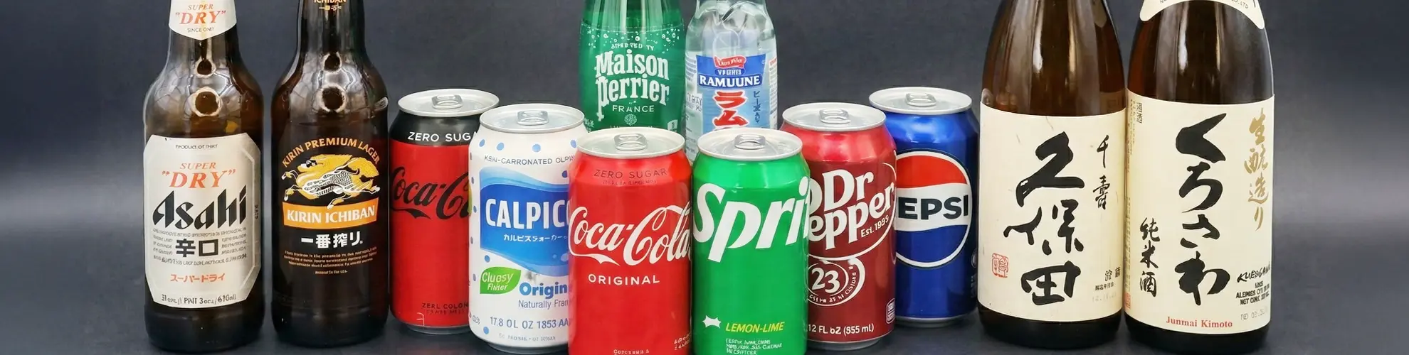 Assorted beverages including soda, Japanese drinks, beer, and sake